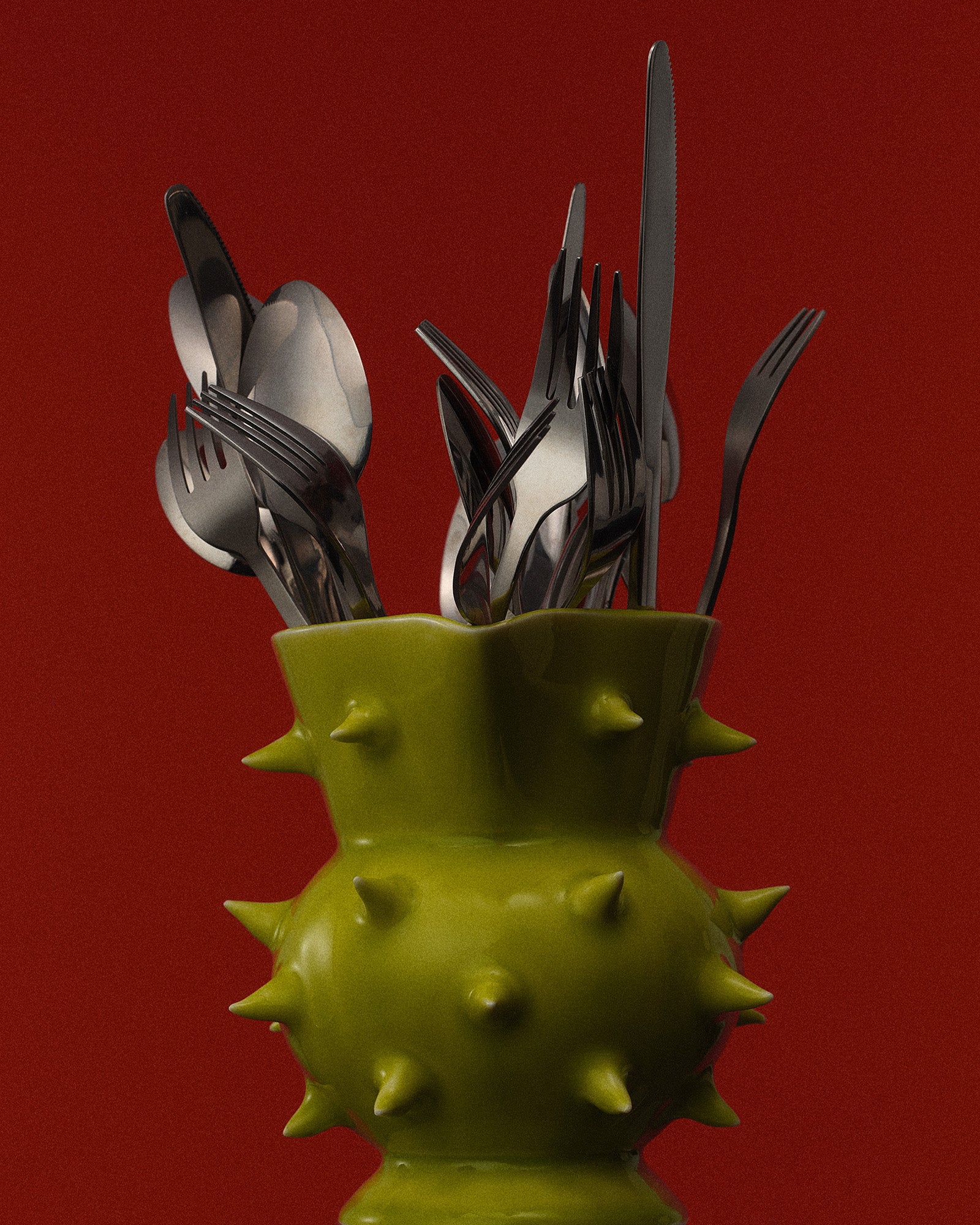 Elegant green glazed pitcher, perfect for modern living spaces and great for both serving beverages or displaying flowers as part of your home decor