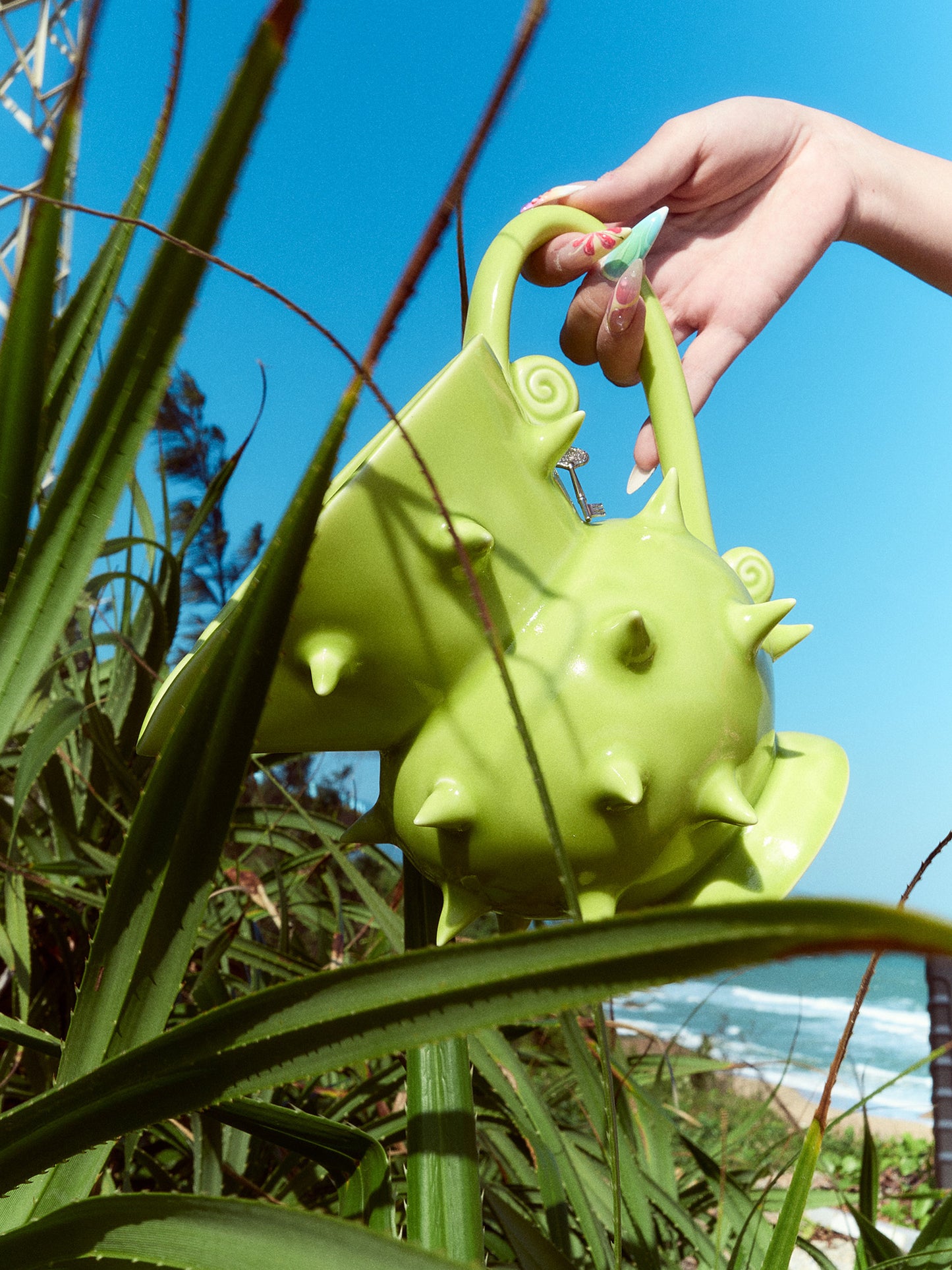 Versatile handmade green pitcher jug, great for serving drinks or as a unique decorative vase for modern living and dining spaces
